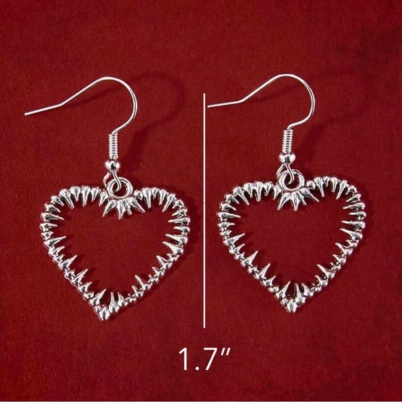 Any 3/$25! Silver Barbed Heart Drop Earrings - Picture 4 of 6